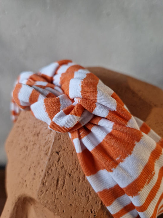 18. trage es wie es dir gefällt – orange/weiß gestreift