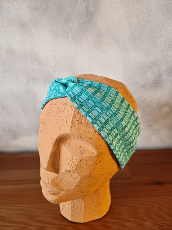 3. Twist-Stirnband – türkis